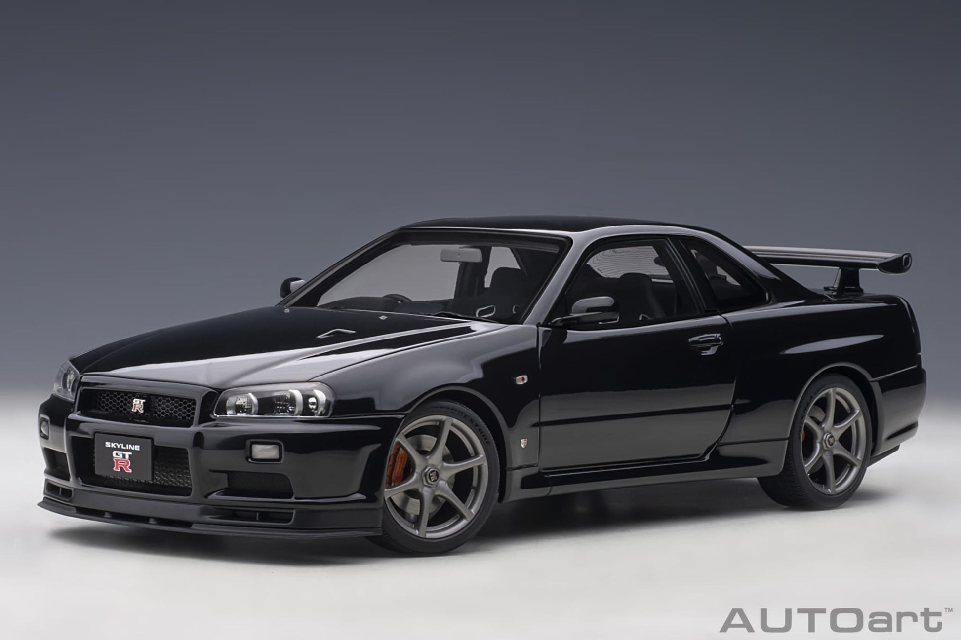 1:18 Nissan R34 Skyline GT-R V-Spec II - Black Pearl - AUTOart - 77407