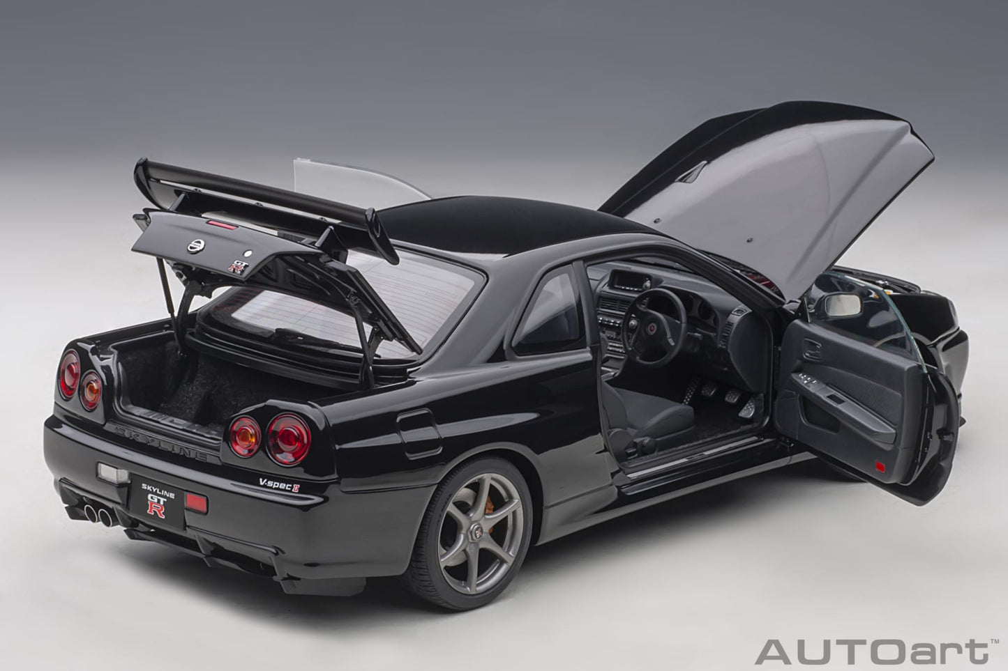 1:18 Nissan R34 Skyline GT-R V-Spec II - Black Pearl - AUTOart - 77407