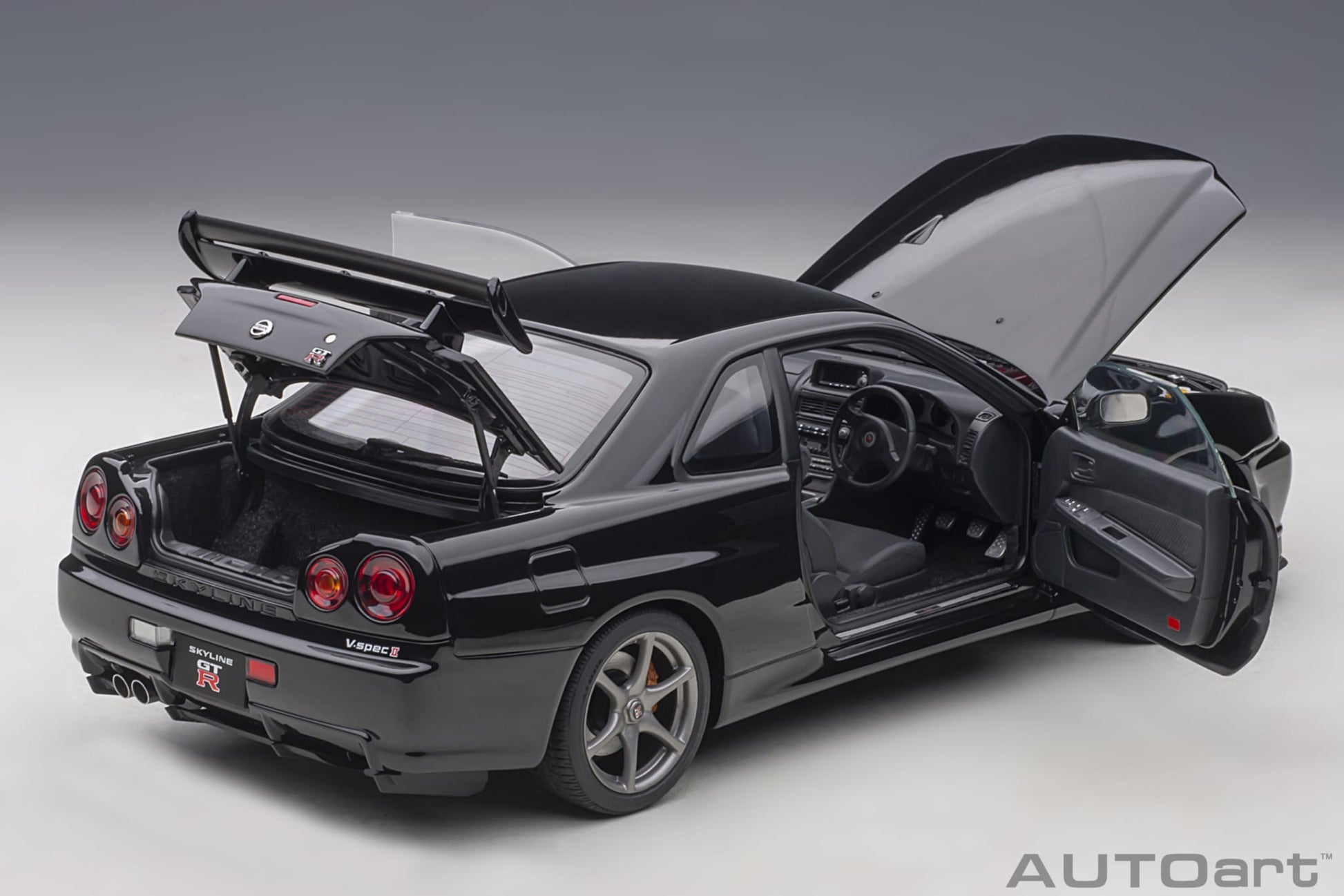 1:18 Nissan R34 Skyline GT-R V-Spec II - Black Pearl - AUTOart - 77407