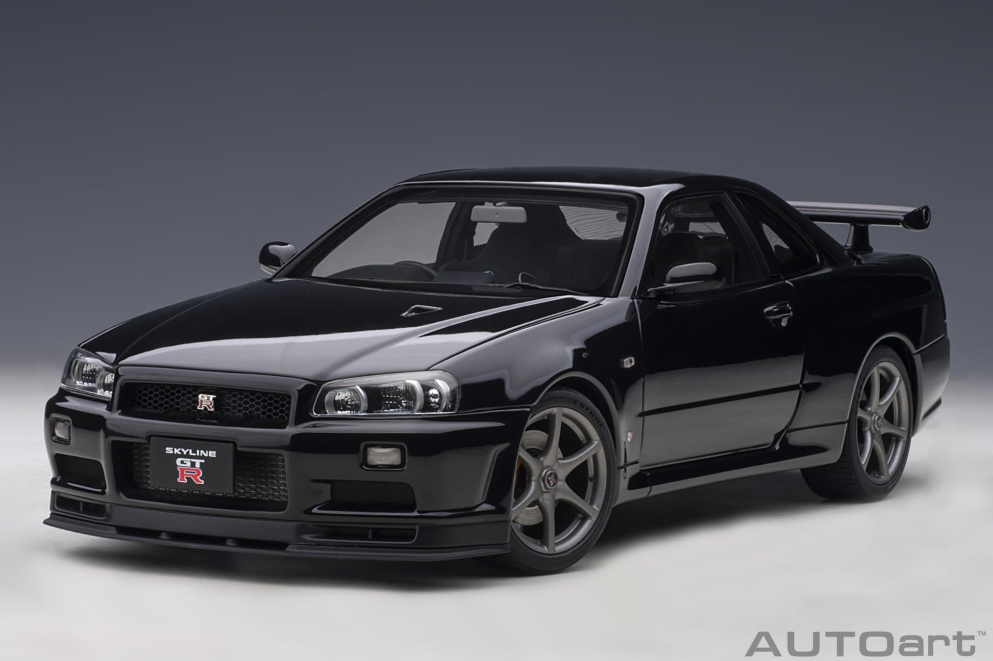 1:18 Nissan R34 Skyline GT-R V-Spec II - Black Pearl - AUTOart - 77407
