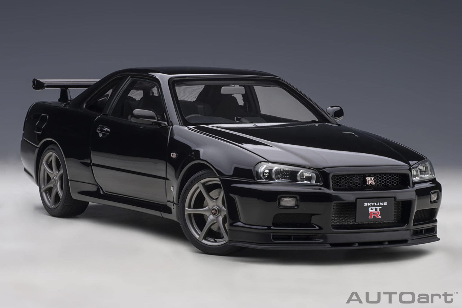 1:18 Nissan R34 Skyline GT-R V-Spec II - Black Pearl - AUTOart - 77407