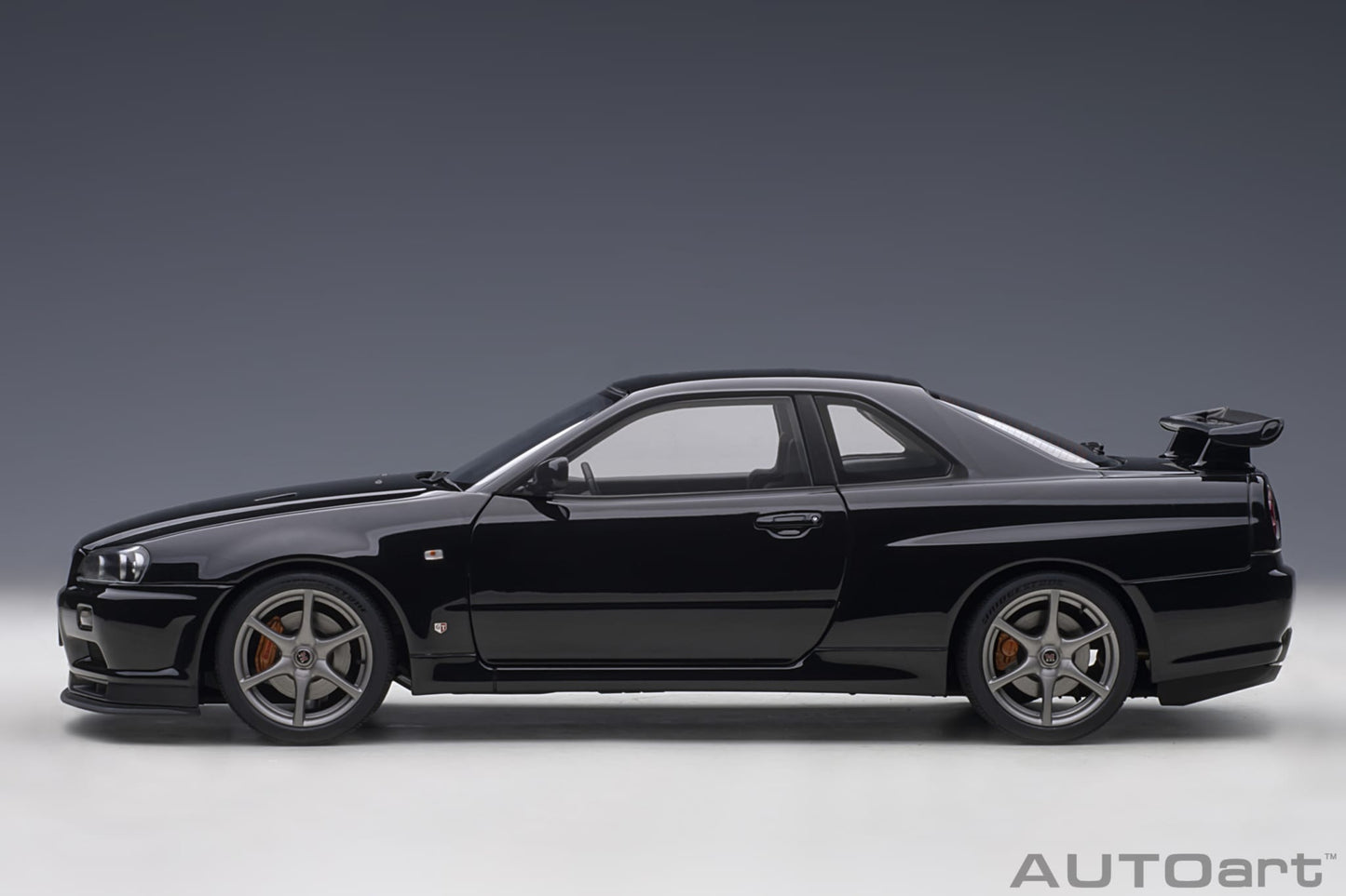 1:18 Nissan R34 Skyline GT-R V-Spec II - Black Pearl - AUTOart - 77407