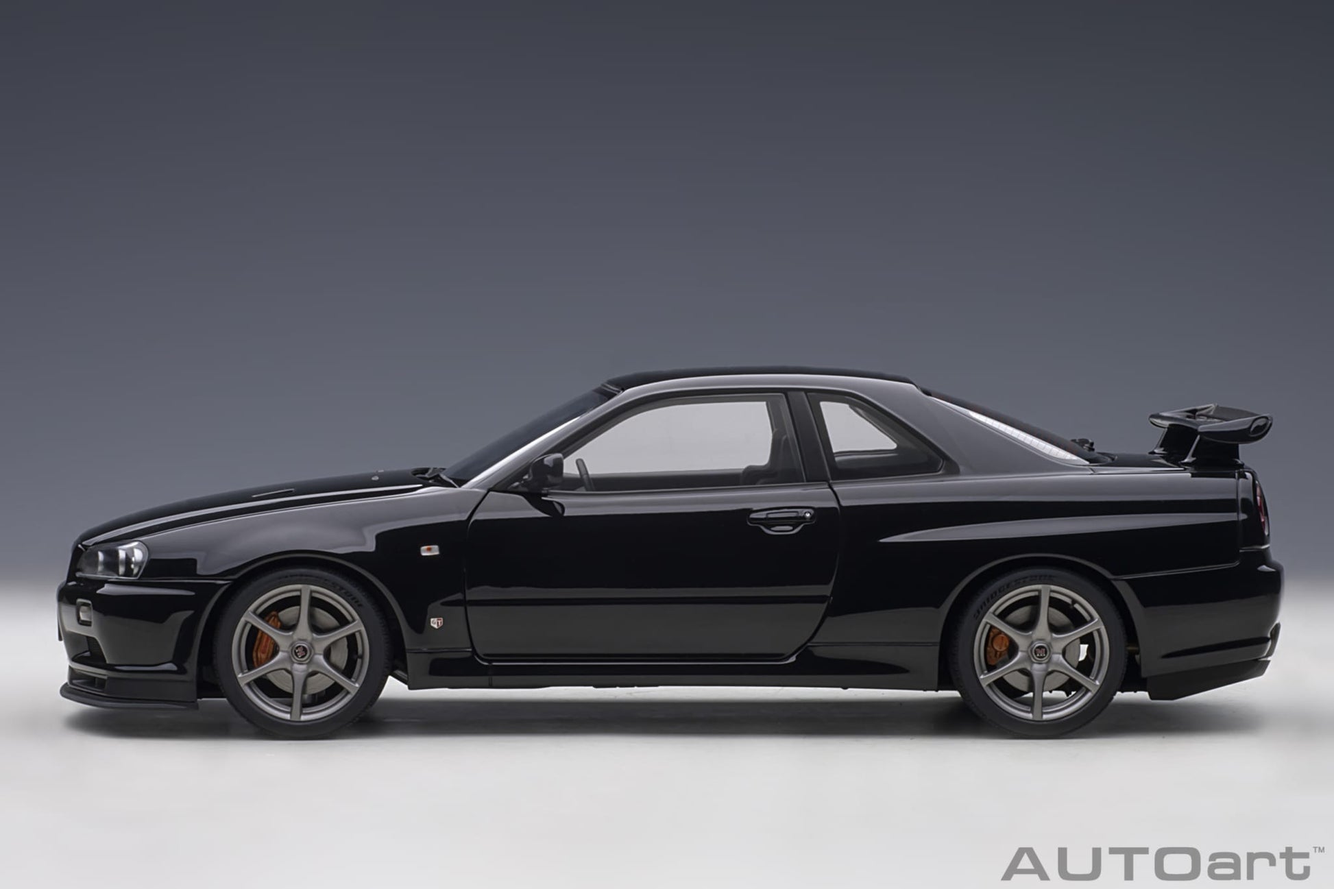 1:18 Nissan R34 Skyline GT-R V-Spec II - Black Pearl - AUTOart - 77407