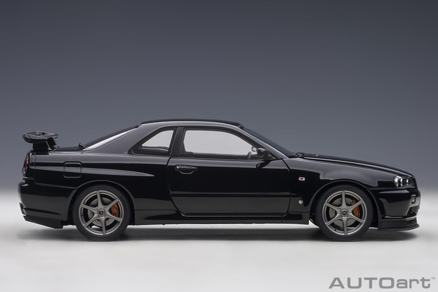 1:18 Nissan R34 Skyline GT-R V-Spec II - Black Pearl - AUTOart - 77407