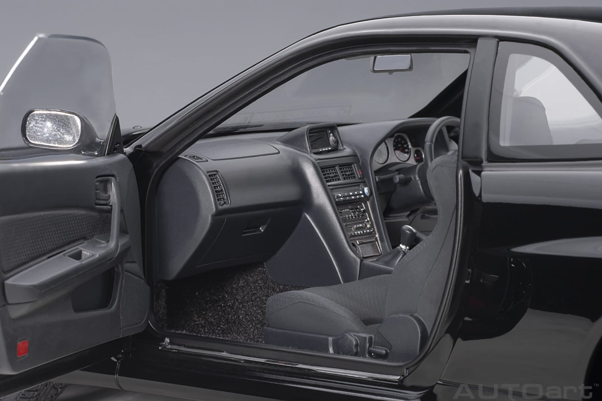 1:18 Nissan R34 Skyline GT-R V-Spec II - Black Pearl - AUTOart - 77407