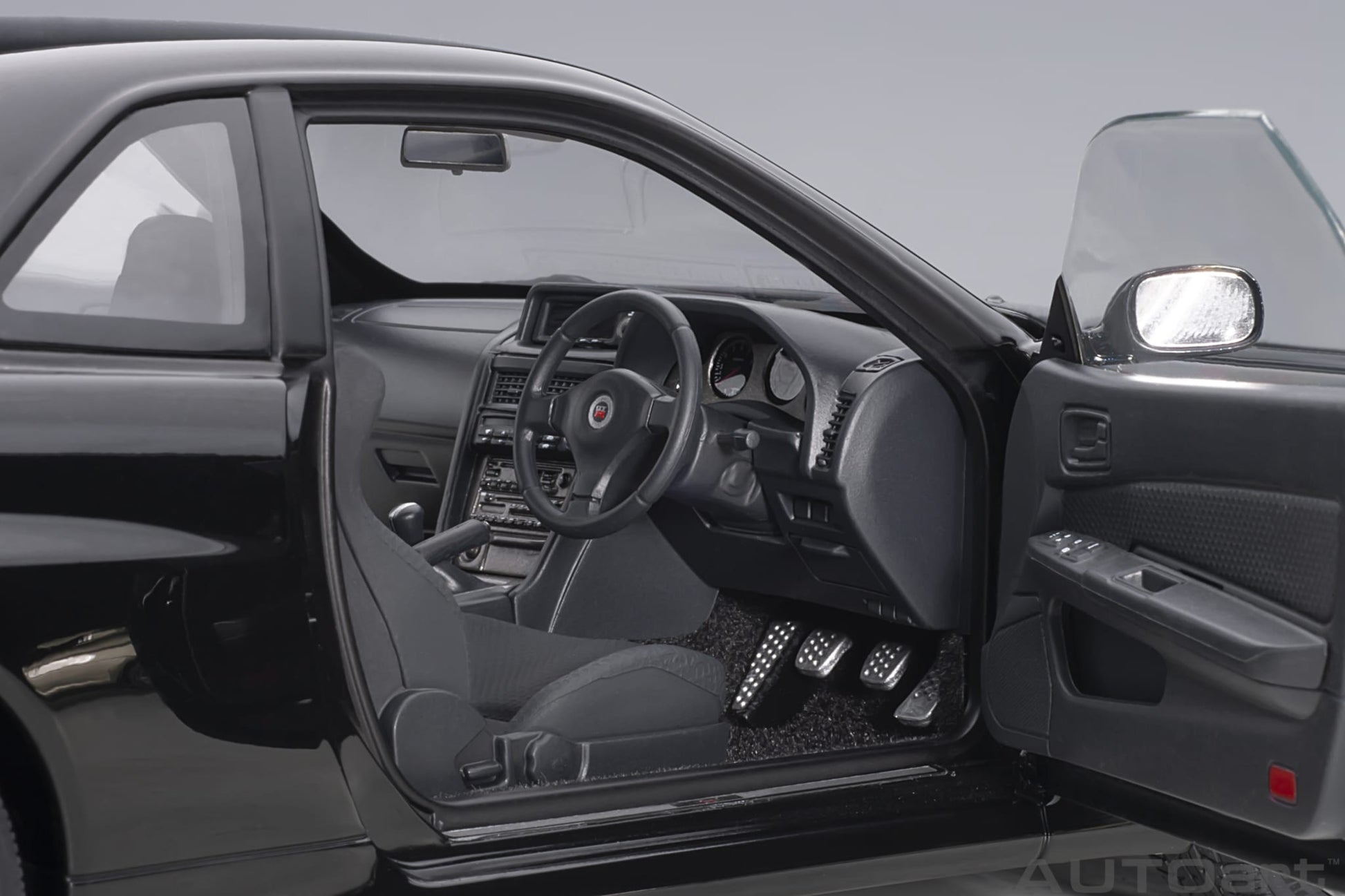 1:18 Nissan R34 Skyline GT-R V-Spec II - Black Pearl - AUTOart - 77407